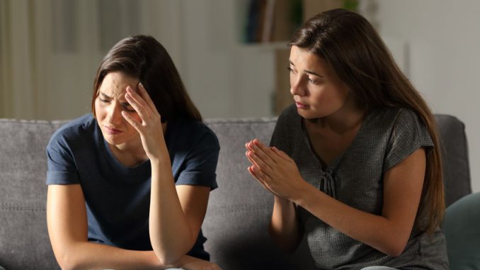 Friend begging forgive in the night at home