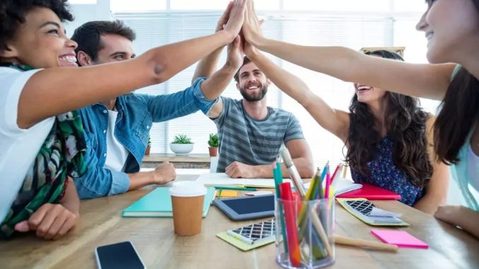 Creative-business-team-putting-hands-together-at-the-office-ezgif.com-webp-to-jpg-converter