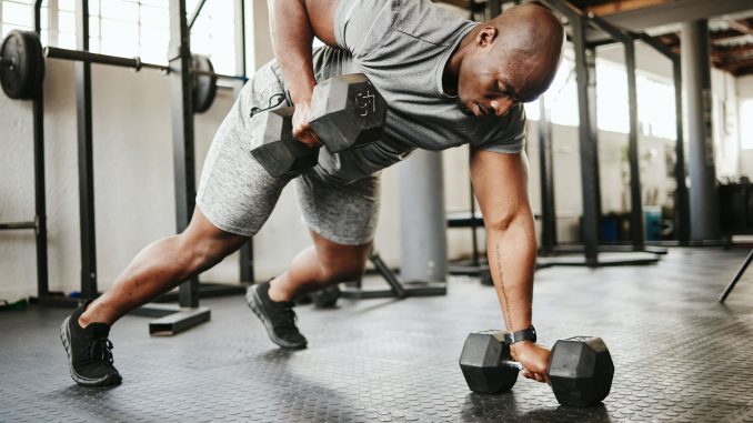 dumbbell-fitness-and-bodybuilder-black-man-with-royalty-free-image-1684408420